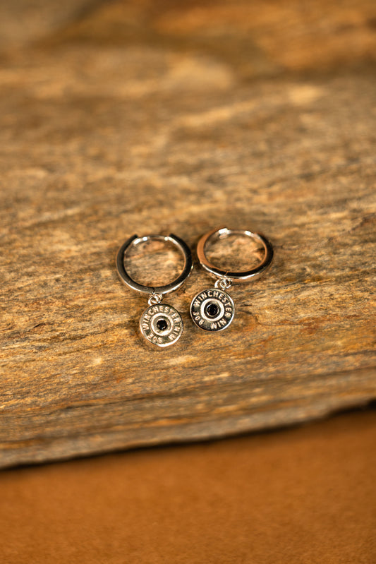 Pair of silver earrings with a winchester bullet pendant